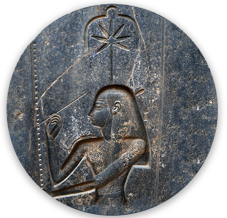 Round stone icon depicting Seshat, the ancient Egyptian goddess of writing, measurement, architecture and accounting.